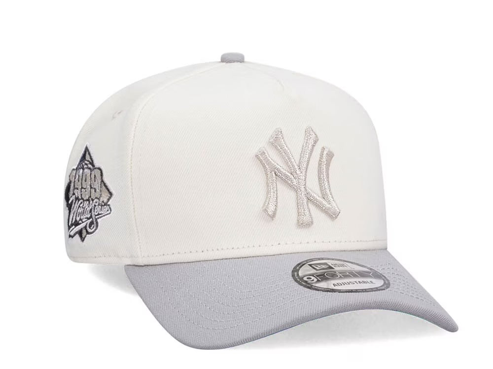 NEW ERA NEW YORK YANKEES WORLD SERIES 1999 CHROME
METALLIC TWO TONE EDITION 9FORTY A FRAME SNAPBACK
GORRA