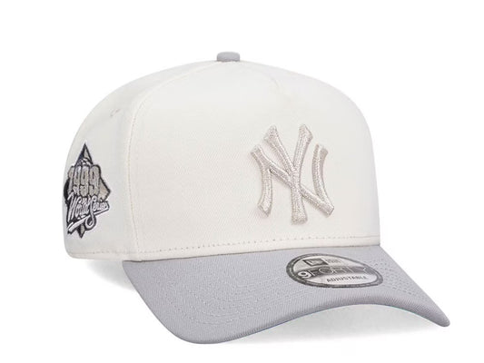 NEW ERA NEW YORK YANKEES WORLD SERIES 1999 CHROME
METALLIC TWO TONE EDITION 9FORTY A FRAME SNAPBACK
GORRA